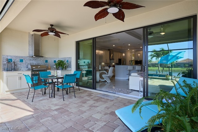 28074 Edenderry Ct, Bonita Springs, FL 34135 - view of patio featuring a ceiling fan and outdoor dining area