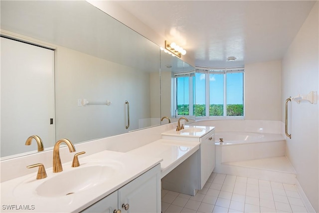 full bath with tile patterned floors, a sink, a bath, and double vanity