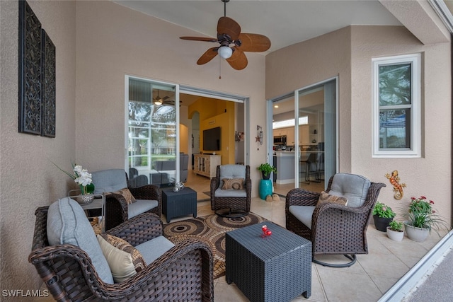 view of patio / terrace with outdoor lounge area and a ceiling fan