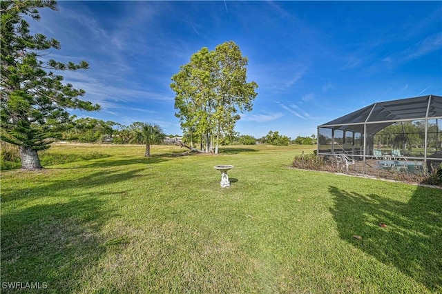 4145 Prestwick Ct, North Fort Myers, FL 33903 - view of yard featuring a lanai