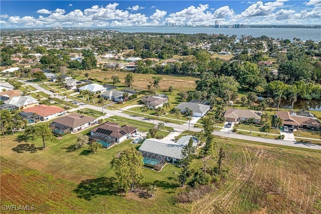 4145 Prestwick Ct, North Fort Myers, FL 33903 - bird's eye view featuring a water view and a residential view