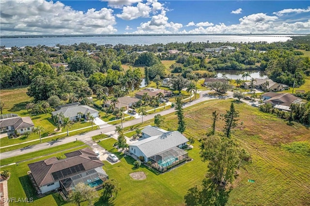 4145 Prestwick Ct, North Fort Myers, FL 33903 - bird's eye view with a water view and a residential view