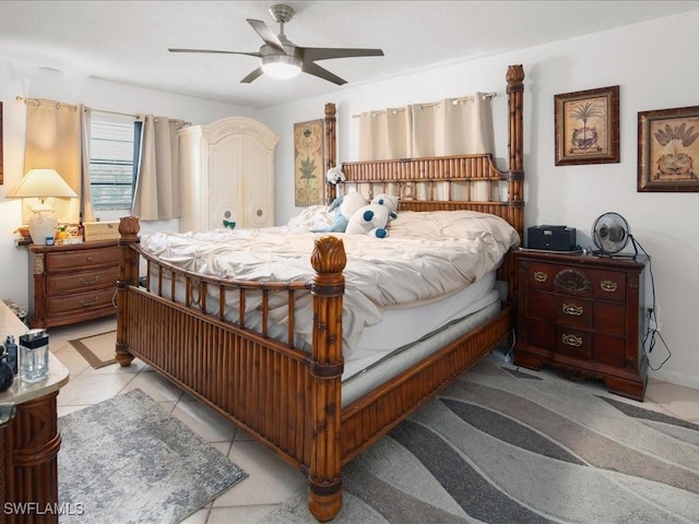 bedroom featuring light tile patterned floors and a ceiling fan