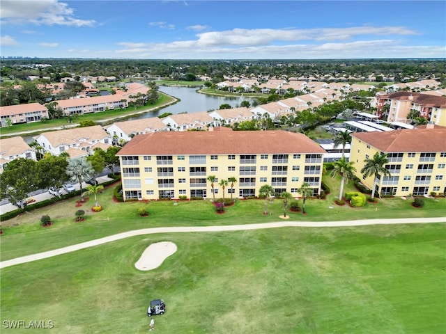 bird's eye view featuring a water view and golf course view