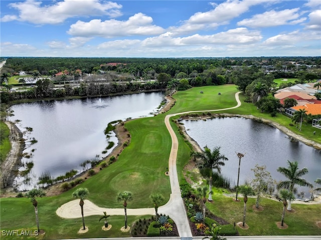 aerial view with view of golf course and a water view