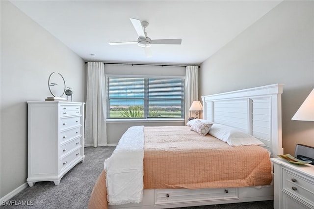 carpeted bedroom with a ceiling fan and baseboards