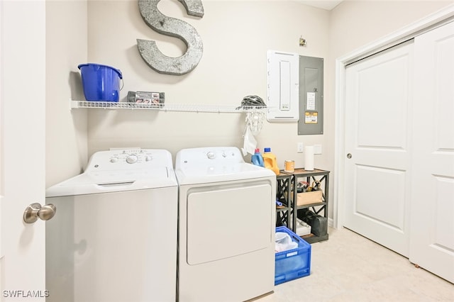 laundry room featuring washer and dryer and laundry area