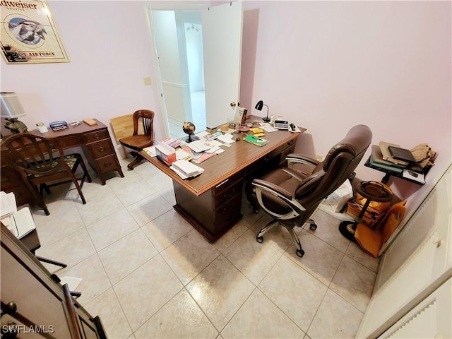 home office featuring light tile patterned flooring