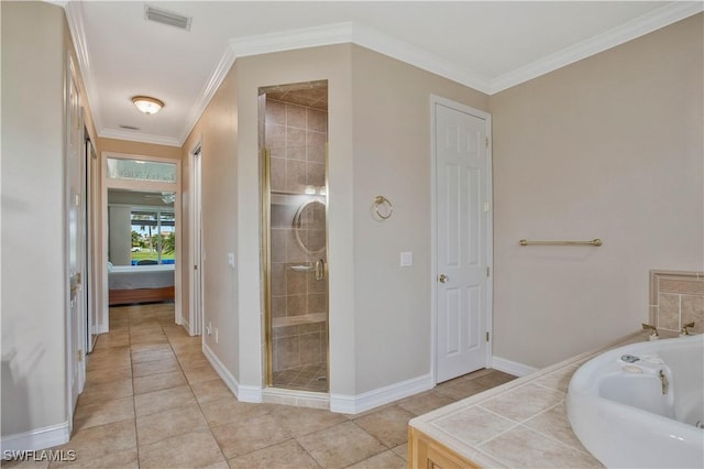 bathroom featuring ensuite bathroom, a bath, visible vents, and crown molding