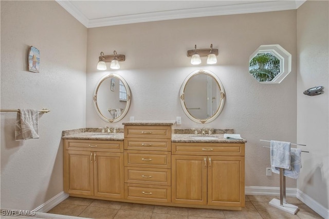 bathroom featuring baseboards, double vanity, a sink, and crown molding