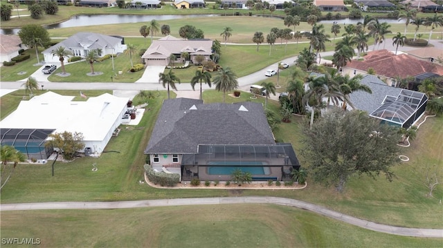 aerial view with a water view and a residential view