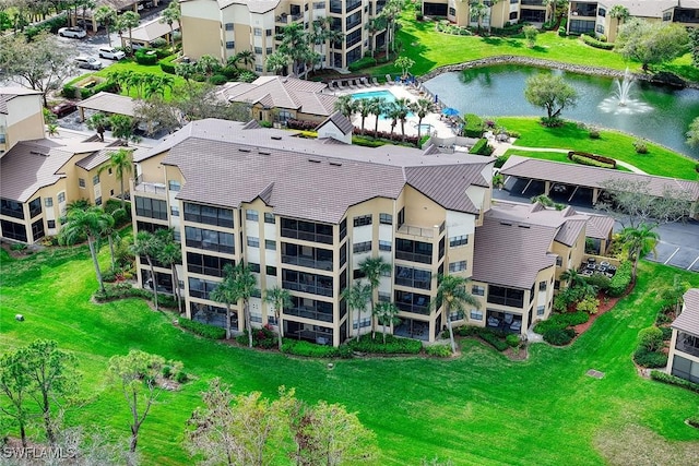 drone / aerial view featuring a water view