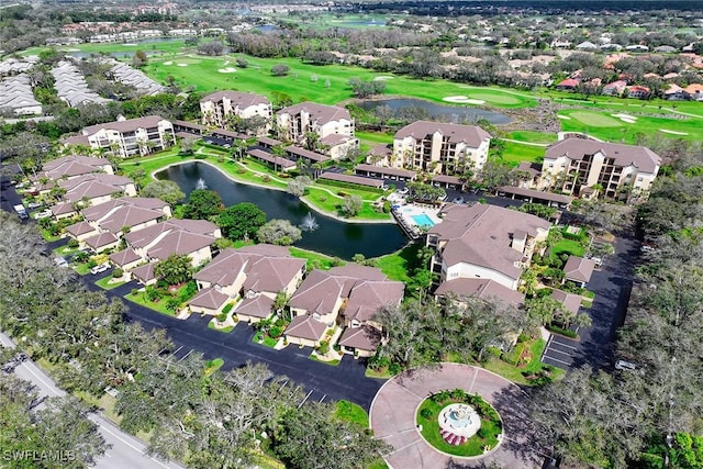 bird's eye view featuring view of golf course and a water view