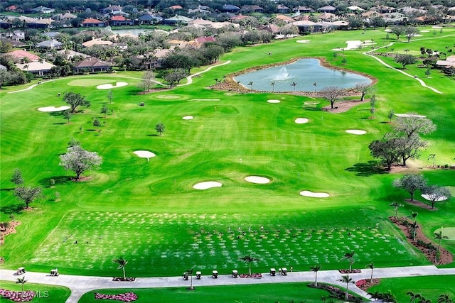 birds eye view of property featuring view of golf course