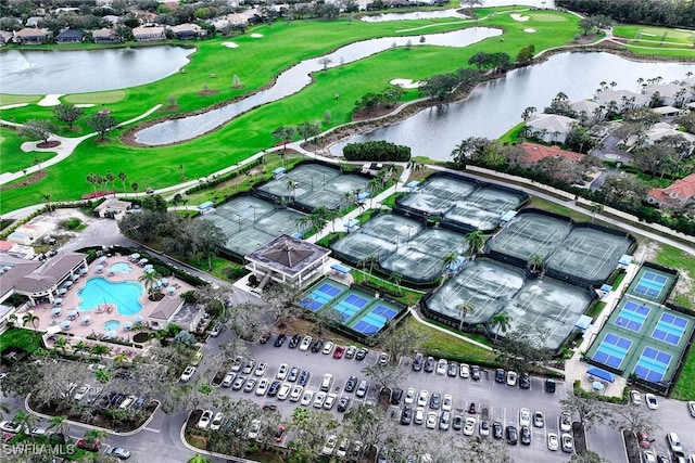 aerial view featuring a water view and golf course view