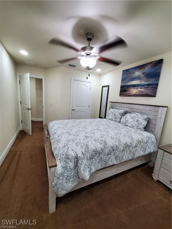 bedroom with ceiling fan, dark colored carpet, recessed lighting, and baseboards