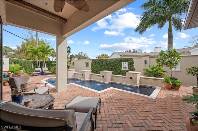 view of patio with ceiling fan, a fenced backyard, and a fenced in pool