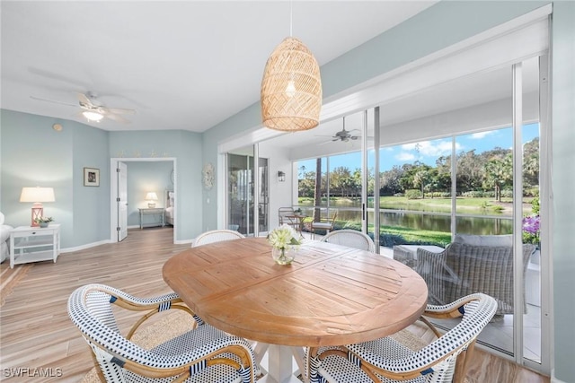 23146 Rosedale Dr Unit 102, Estero, FL 34135 - sunroom featuring ceiling fan, plenty of natural light, and a water view