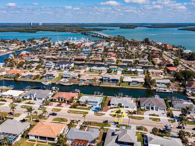 aerial view featuring a water view and a residential view