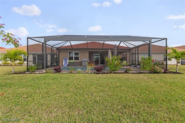 4178 Bloomfield St, Fort Myers, FL 33916 - rear view of property with a yard, stucco siding, and a lanai