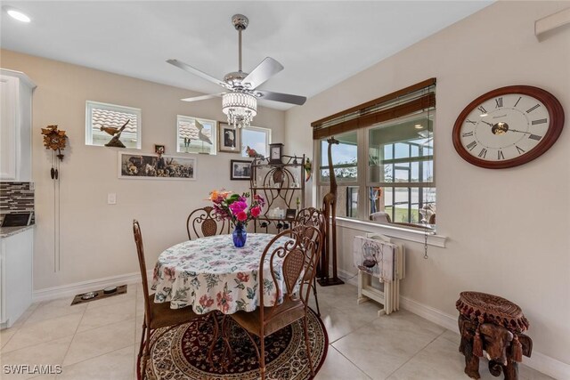 4178 Bloomfield St, Fort Myers, FL 33916 - dining space with ceiling fan, light tile patterned flooring, and baseboards