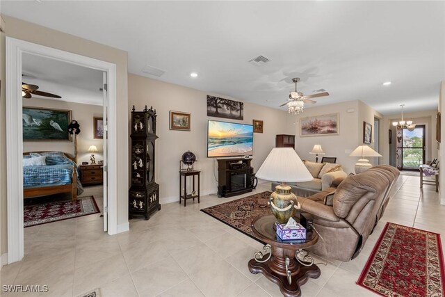 4178 Bloomfield St, Fort Myers, FL 33916 - living area featuring ceiling fan, a chandelier, recessed lighting, baseboards, and light tile patterned floors