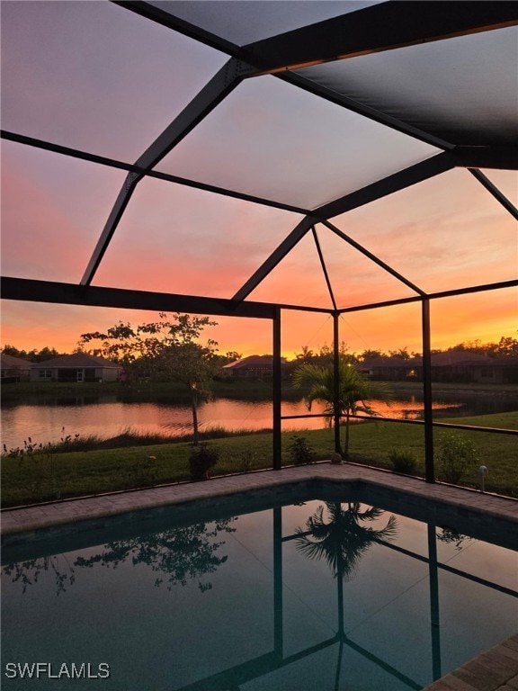 4178 Bloomfield St, Fort Myers, FL 33916 - outdoor pool featuring a water view, a lanai, and a lawn