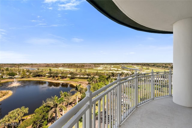 balcony featuring a water view