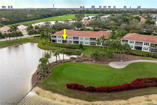 bird's eye view featuring a water view and golf course view