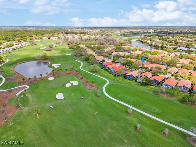 aerial view featuring a residential view, a water view, and golf course view