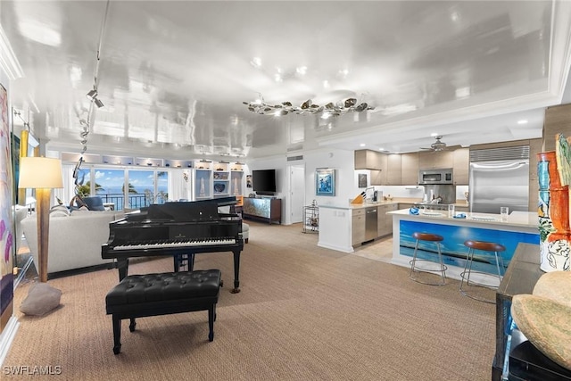 interior space featuring a ceiling fan and light carpet