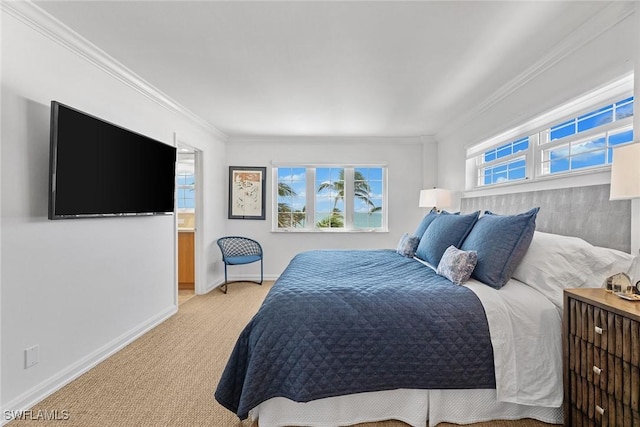 bedroom featuring light carpet, baseboards, and crown molding