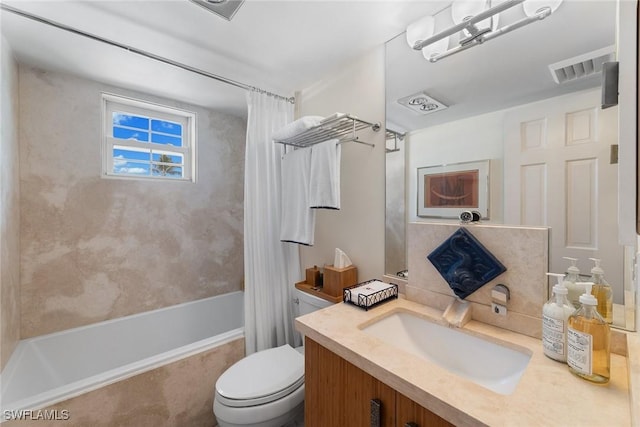 bathroom with shower / bath combo, visible vents, vanity, and toilet