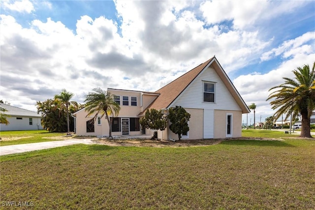 view of front of house with a front yard