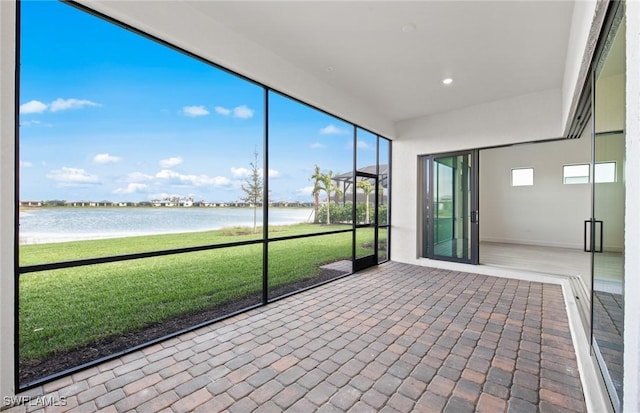 18372 Ridgeline Dr, Estero, FL 33928 - unfurnished sunroom with a water view