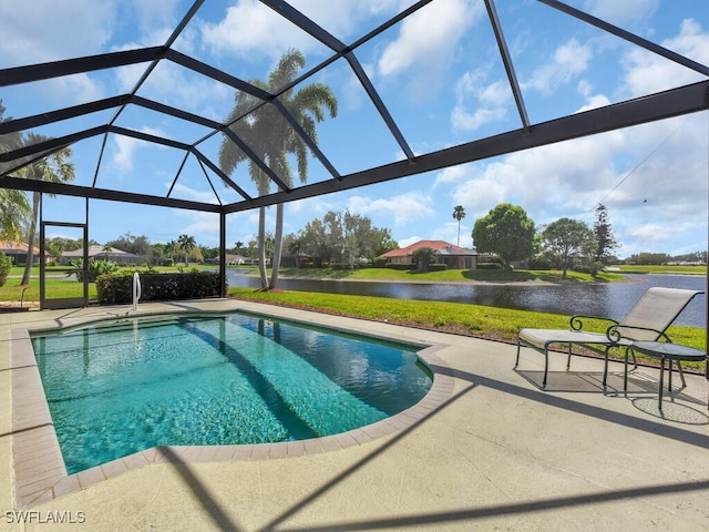 outdoor pool featuring a patio, a water view, and a lanai