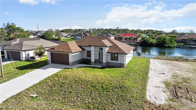 view of front of home featuring a water view, stucco siding, a residential view, and a front yard