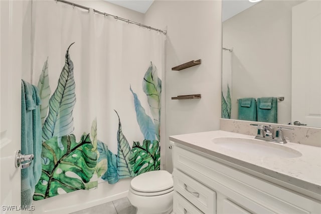 full bathroom featuring toilet, tile patterned flooring, shower / bath combination with curtain, and vanity