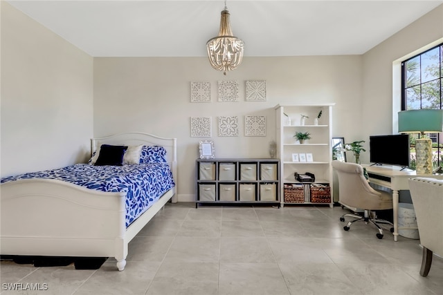 bedroom with light tile patterned floors and an inviting chandelier