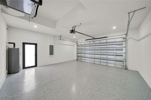 garage featuring a garage door opener, recessed lighting, gas water heater, and electric panel