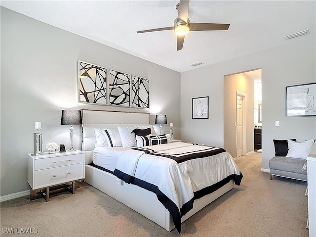 bedroom featuring baseboards, a ceiling fan, visible vents, and light colored carpet