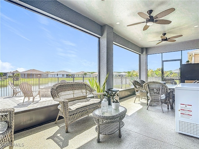 sunroom / solarium with a residential view