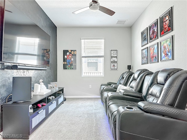 living room with light carpet, ceiling fan, visible vents, and a textured ceiling