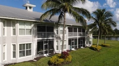 exterior space with a water view