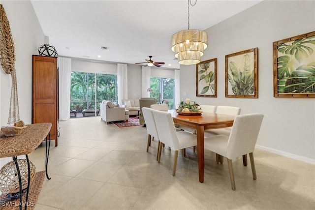 dining room with light tile patterned flooring, a notable chandelier, recessed lighting, visible vents, and baseboards