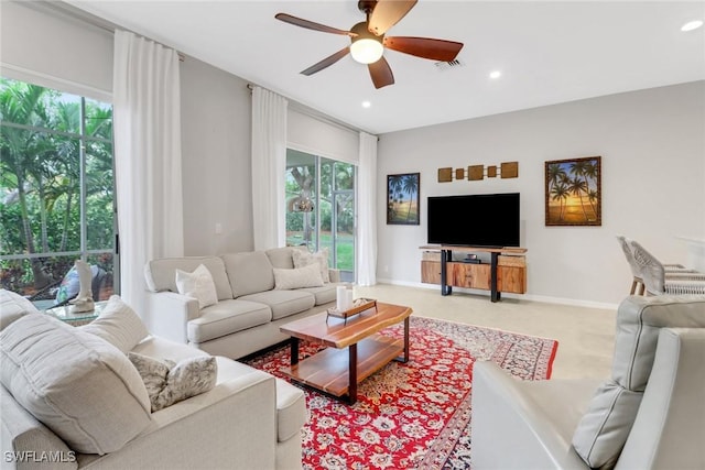 living room featuring recessed lighting, visible vents, ceiling fan, and baseboards