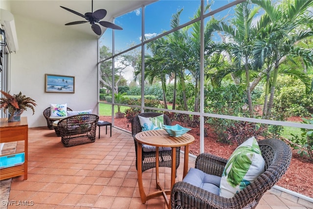 sunroom with a ceiling fan