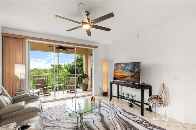 living area featuring light tile patterned flooring and a ceiling fan