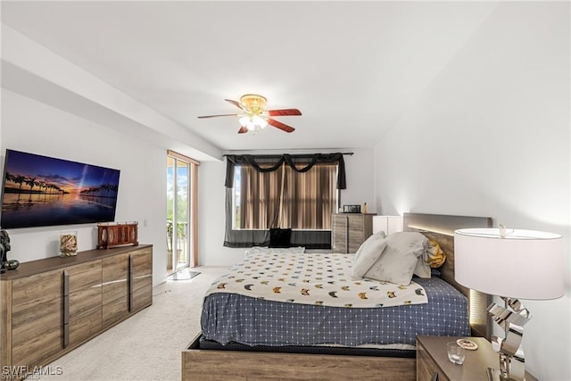 bedroom featuring light carpet, access to outside, and a ceiling fan