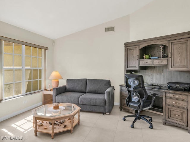 office with visible vents, baseboards, and light tile patterned flooring